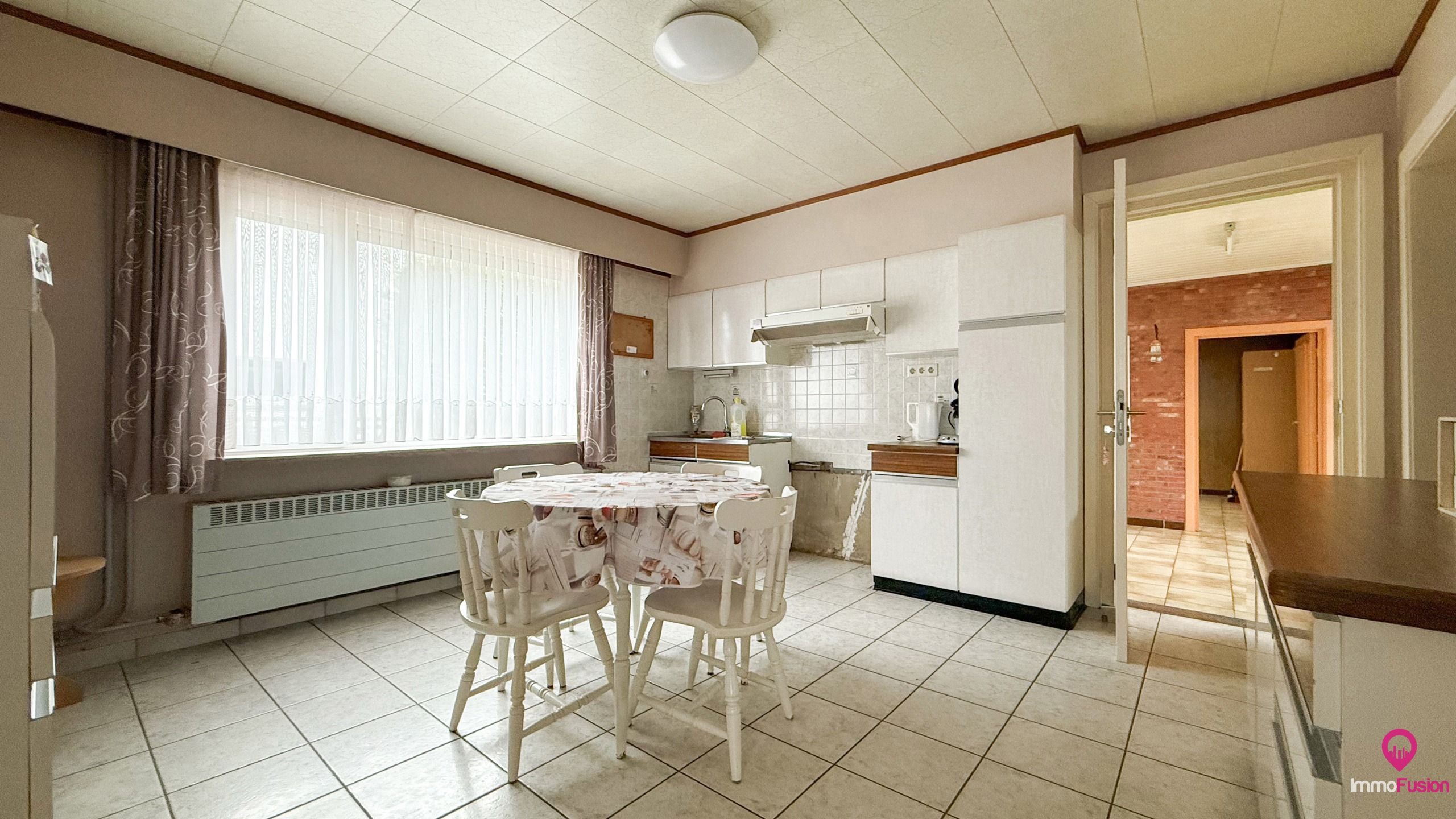 Te vernieuwen woning met 4 slaapkamers en zonnige tuin! foto 7