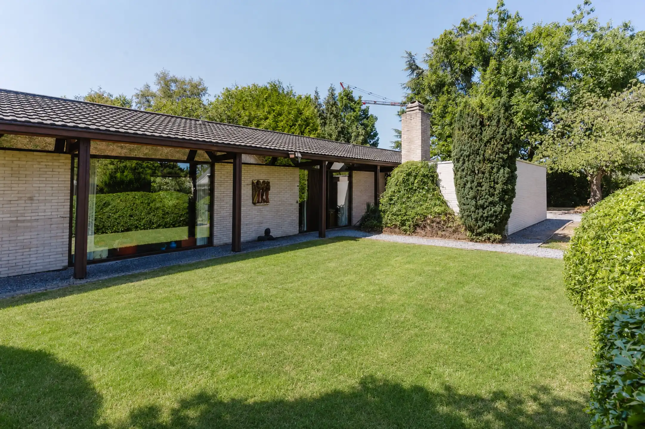 Architectenbungalow op een perceel van 1465m² in De Pinte foto 2