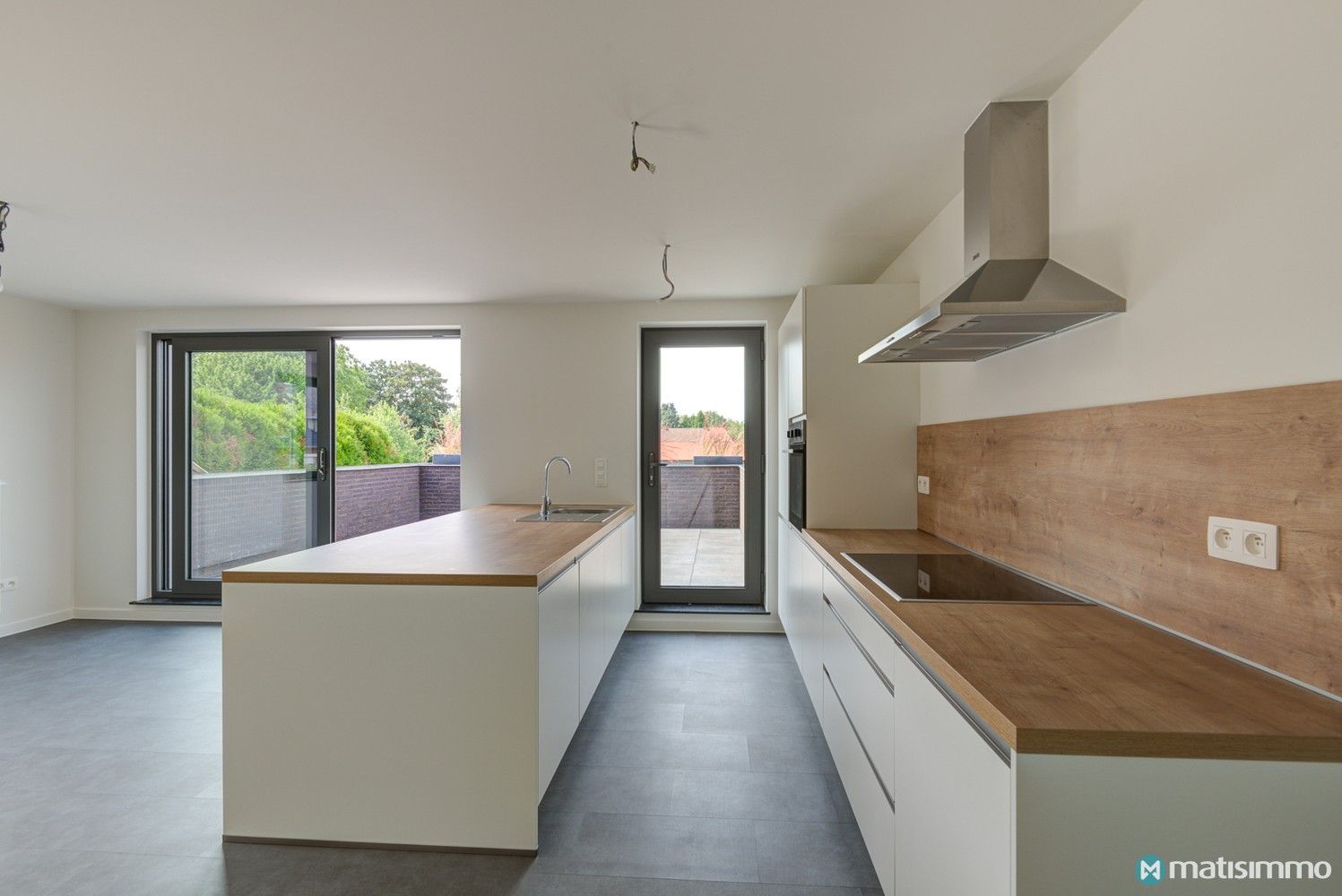 INSTAPKLAAR DUPLEXAPPARTEMENT MET 2 SLAAPKAMERS EN CARPORT IN MOPERTINGEN (BILZEN) foto 6