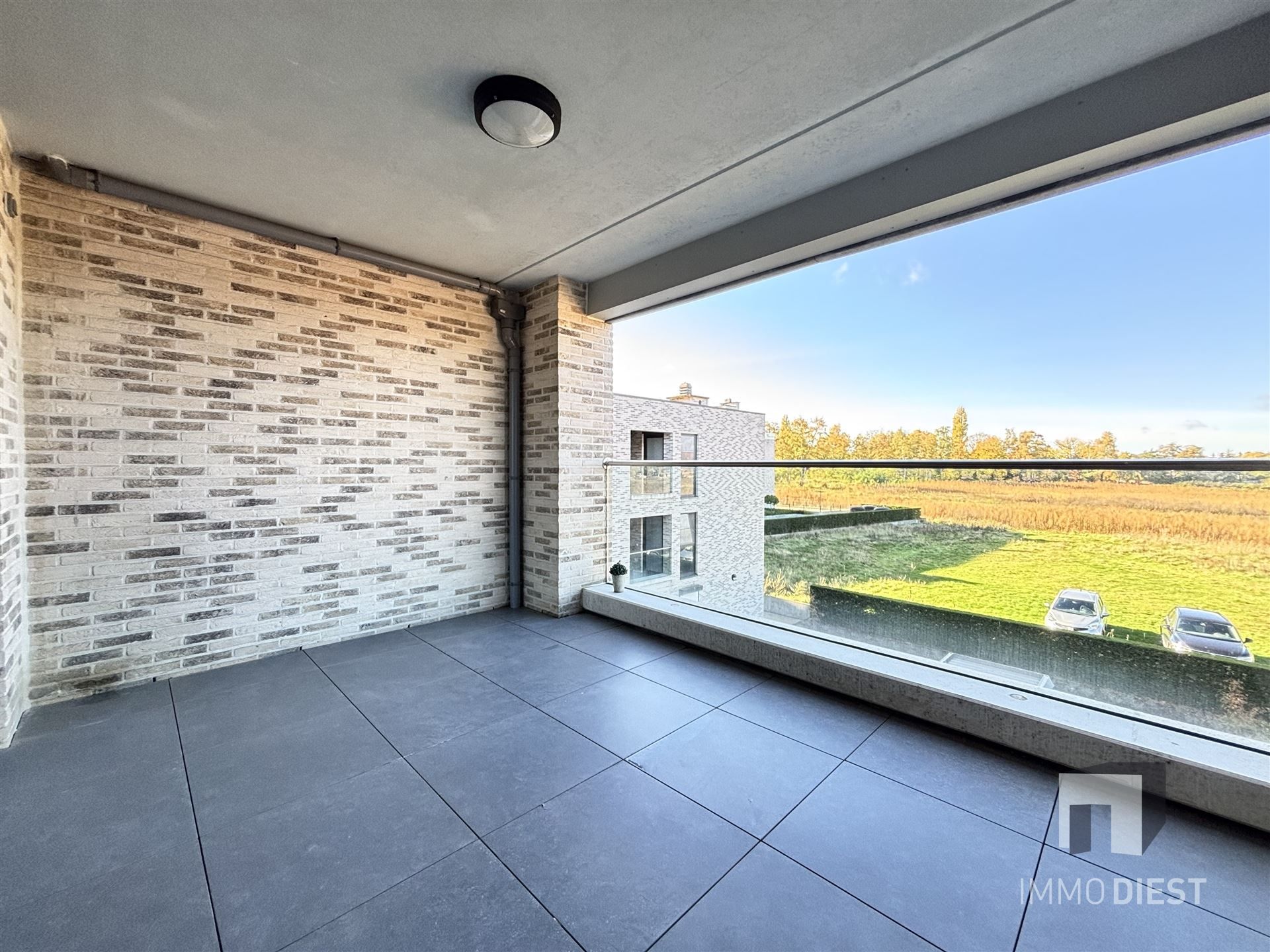 Ruim appartement op de tweede verdieping in het centrum van Tessenderlo foto 17