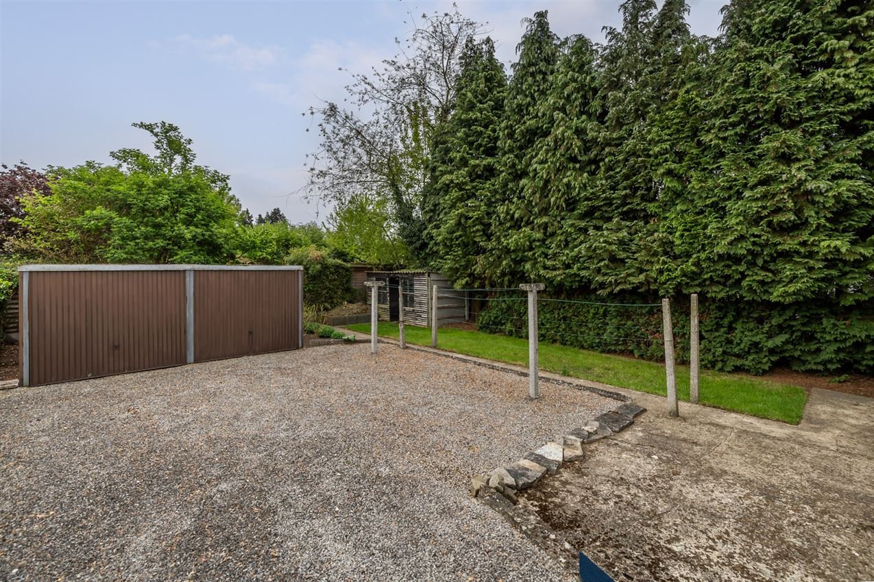 Te renoveren woning met 4 slk. in het hart van Averbode foto 3