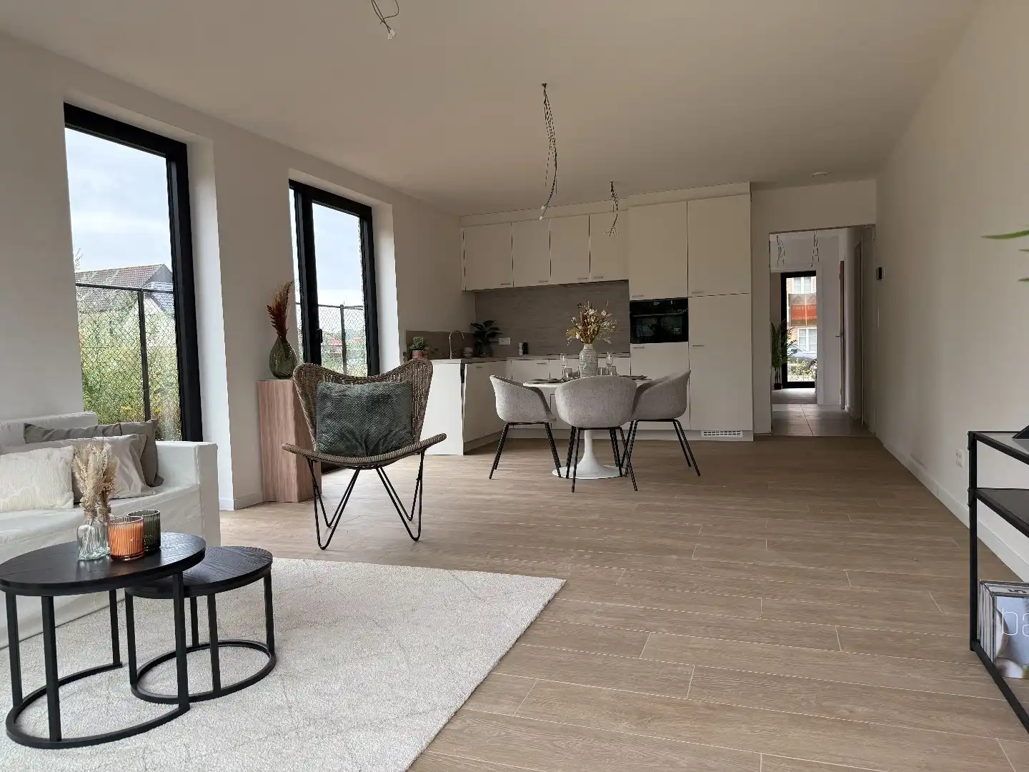 Laatste gelijkvloers 2-slpk appartement met tuin, 1 stpls en een kelder foto 6