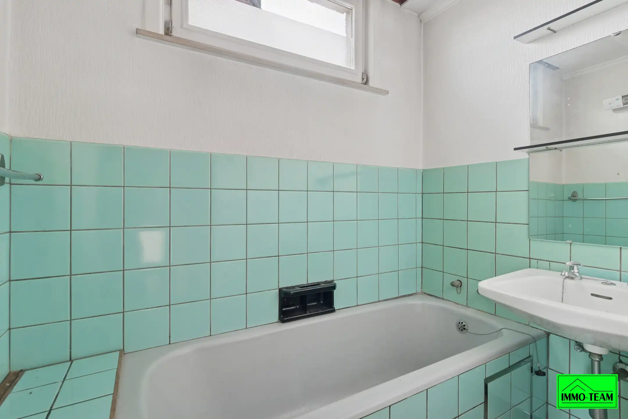 Te renoveren 4-gevel woning met garage en tuin foto 14