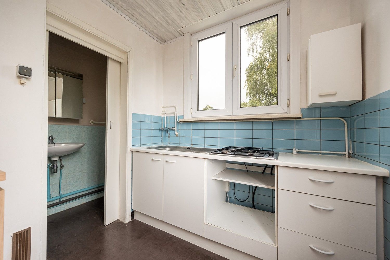 Te renoveren opbrengsteigendom met 3 éénslaapkamerappartementen nabij het Boekenbergpark foto 21