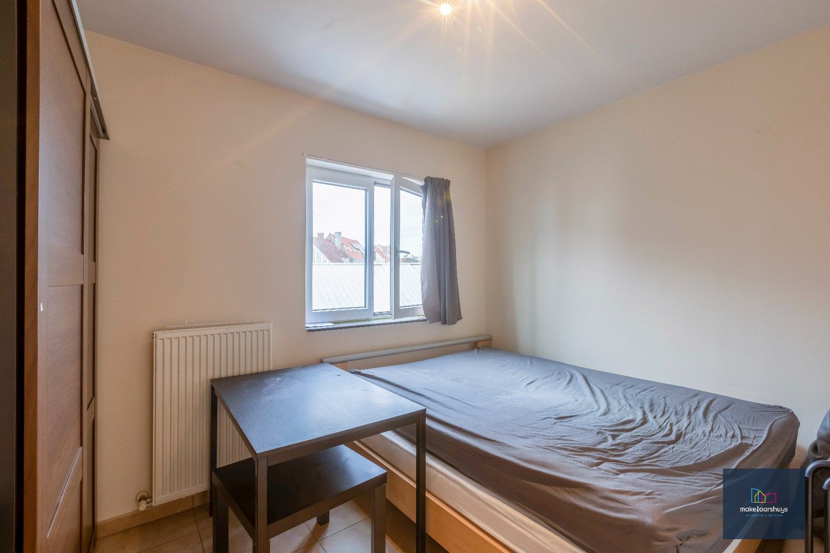  Zeer verzorgd 1-slaapkamerappartement met balkon en staanplaats foto 11