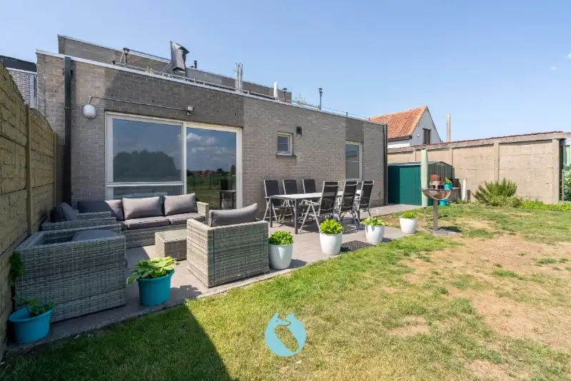 Kleinschalig gebouw met 2 appartementen en 2 garages foto 10