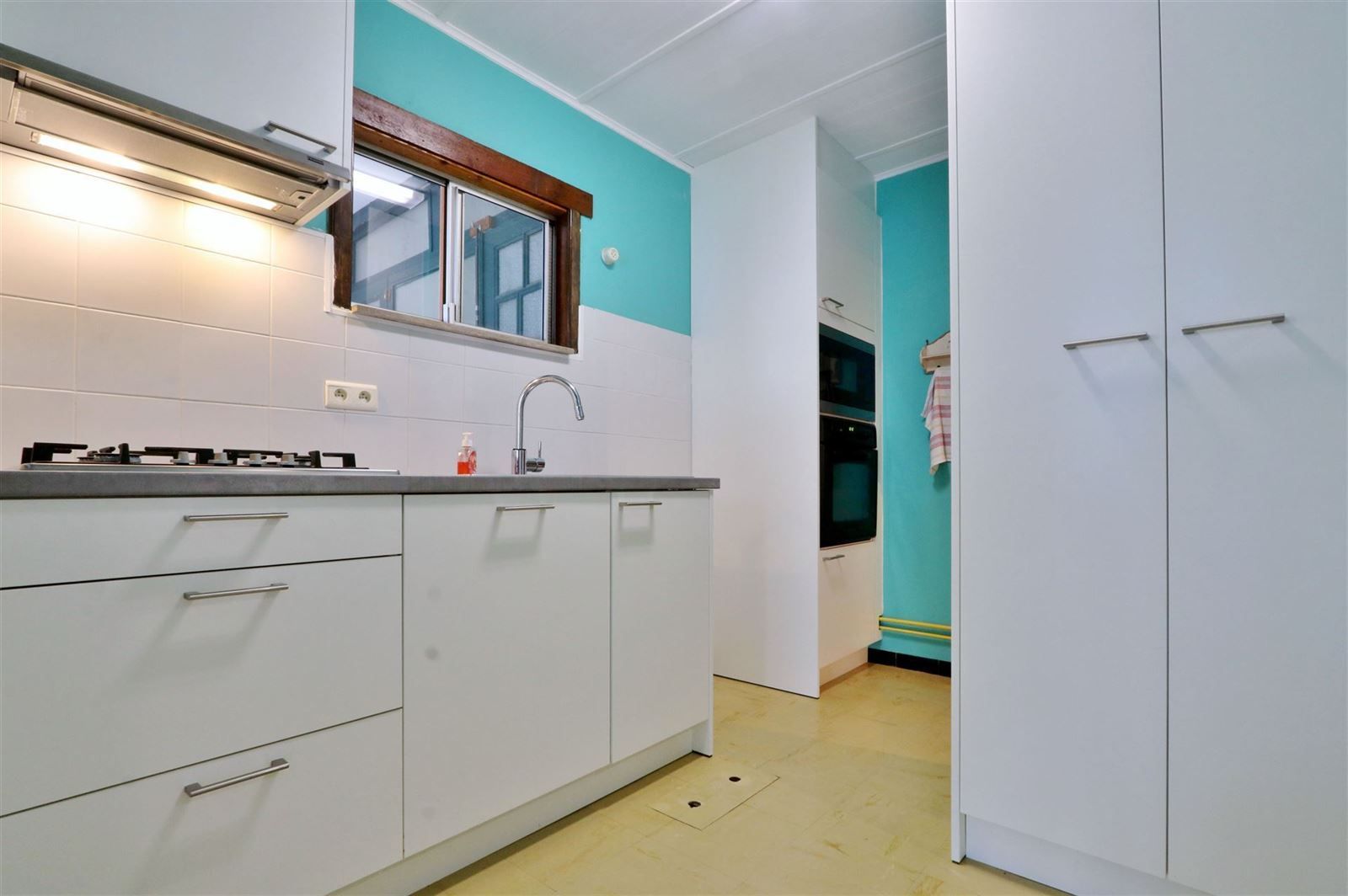 Opbrengstwoning met 2 appartementen en 3 garageboxen foto 8