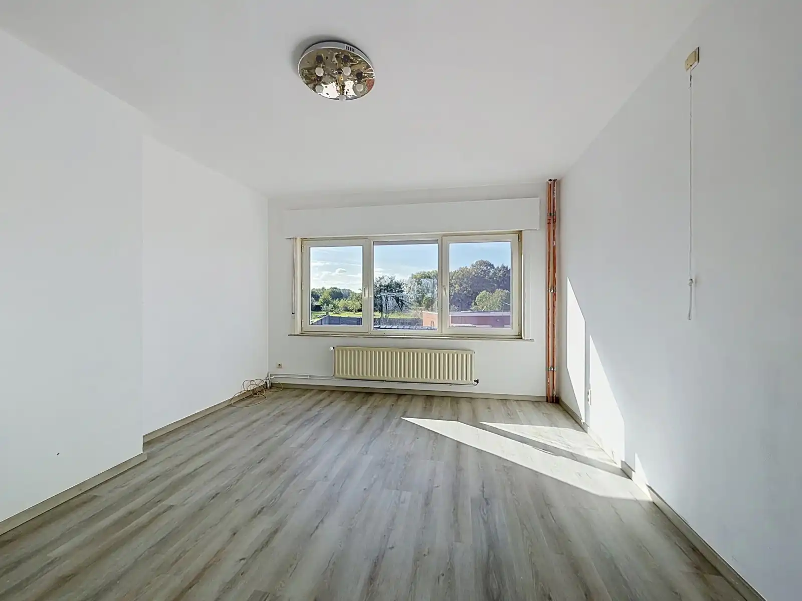 Gezinswoning met 3 SLPK, Tuin én Garage! foto 9