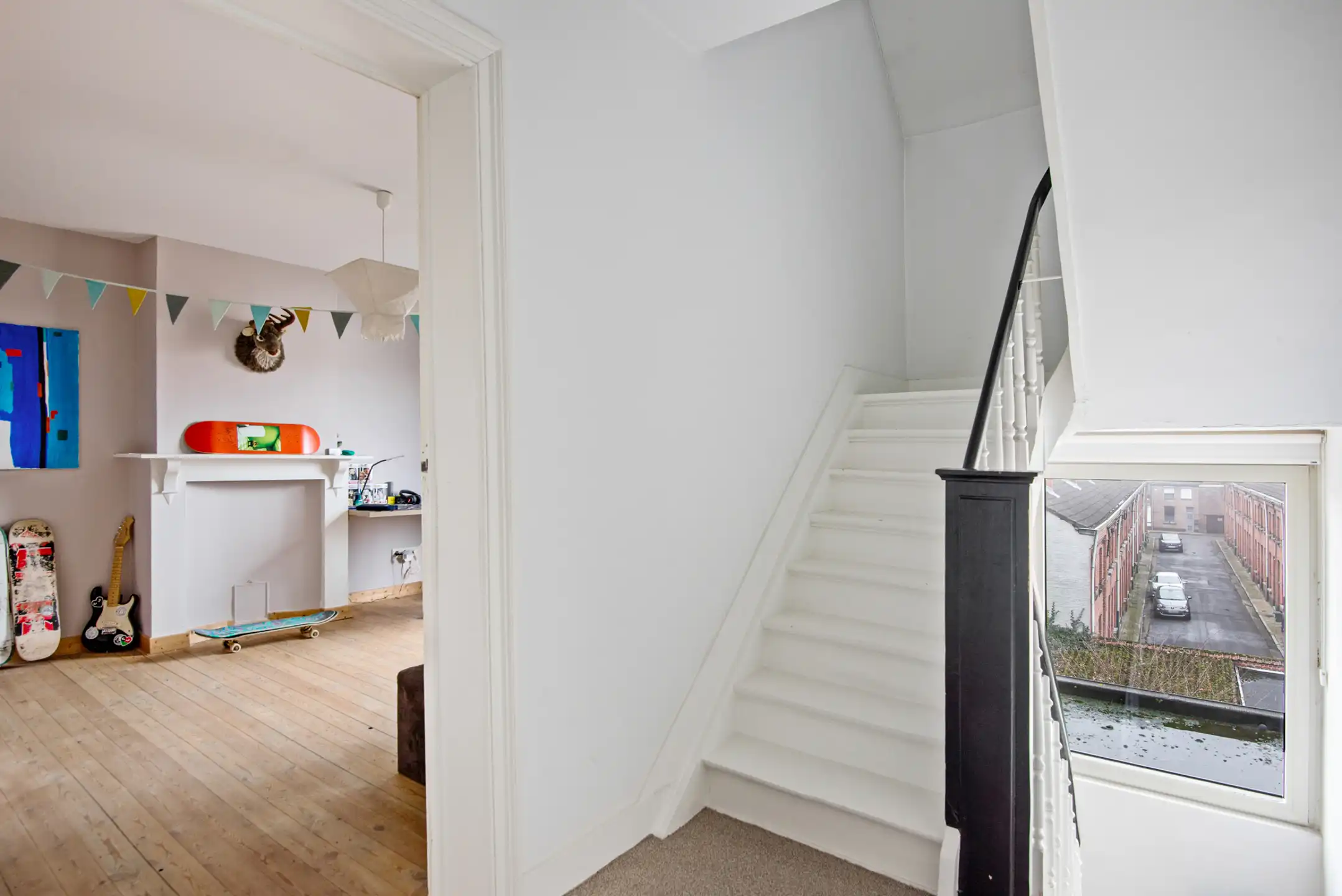 In het centrum gel. stadswoning met 5 slpk., terras, tuin en garage foto 27