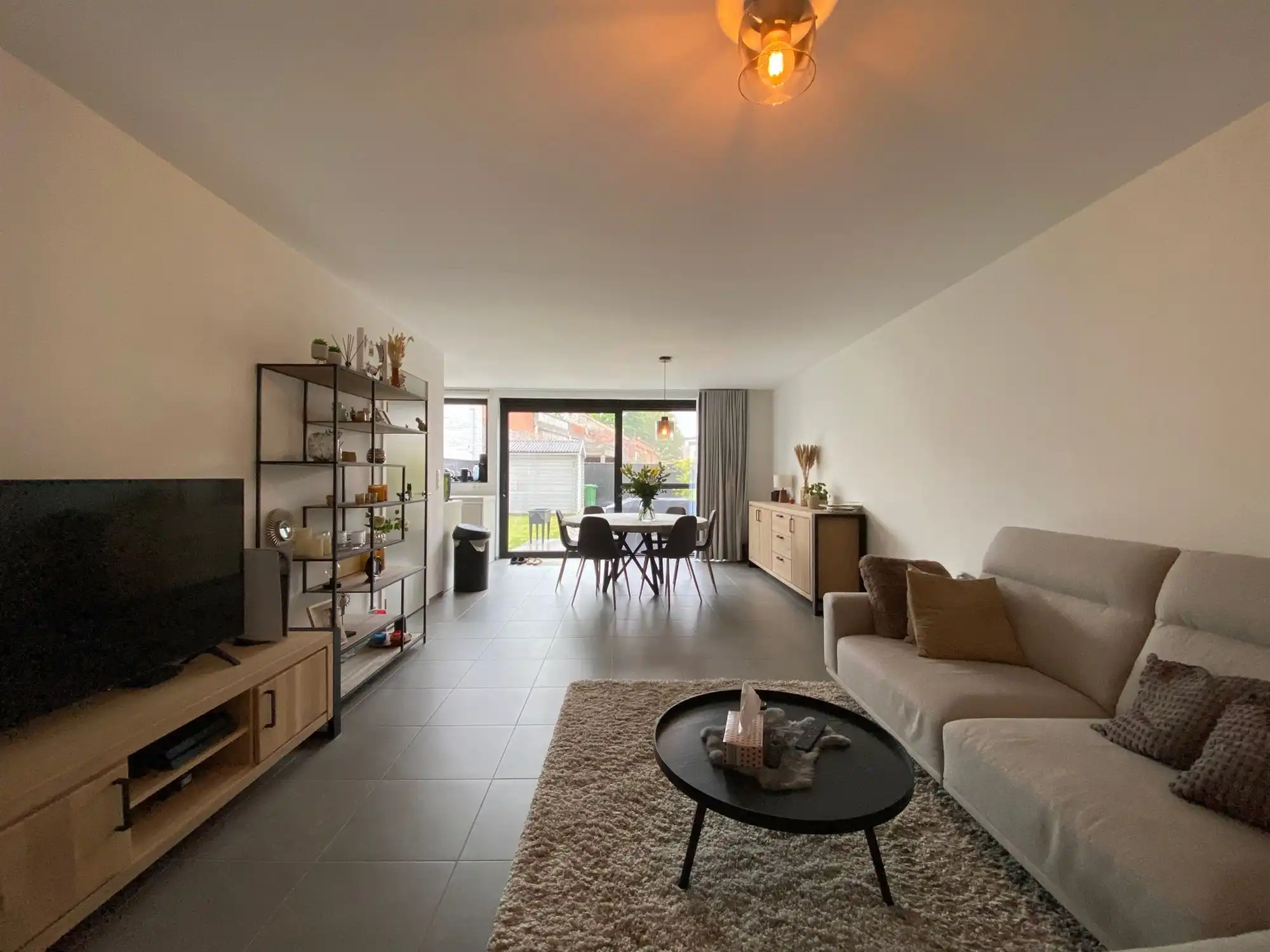 Knap en energiezuinig gelijkvloers appartement met 2-slpk, aangename tuin en een autostaanplaats foto 4