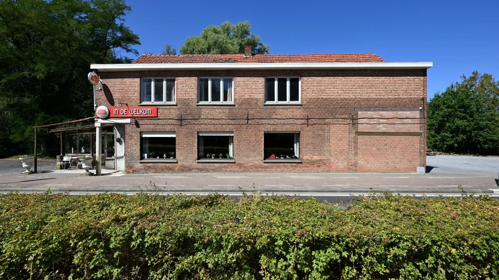 Hoofdfoto van de publicatie: (Handels)pand met woonst op 13,5a met ruime parking en veel mogelijkheden te Baal