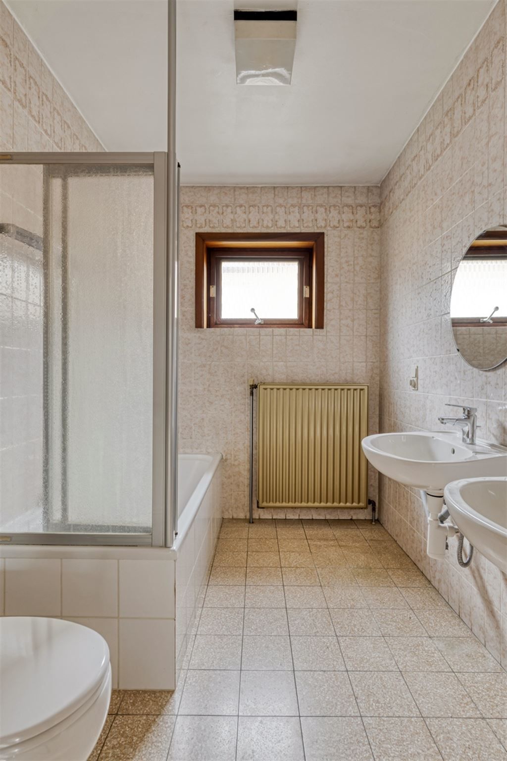 Op te frissen woning te Wilsele!  foto 12