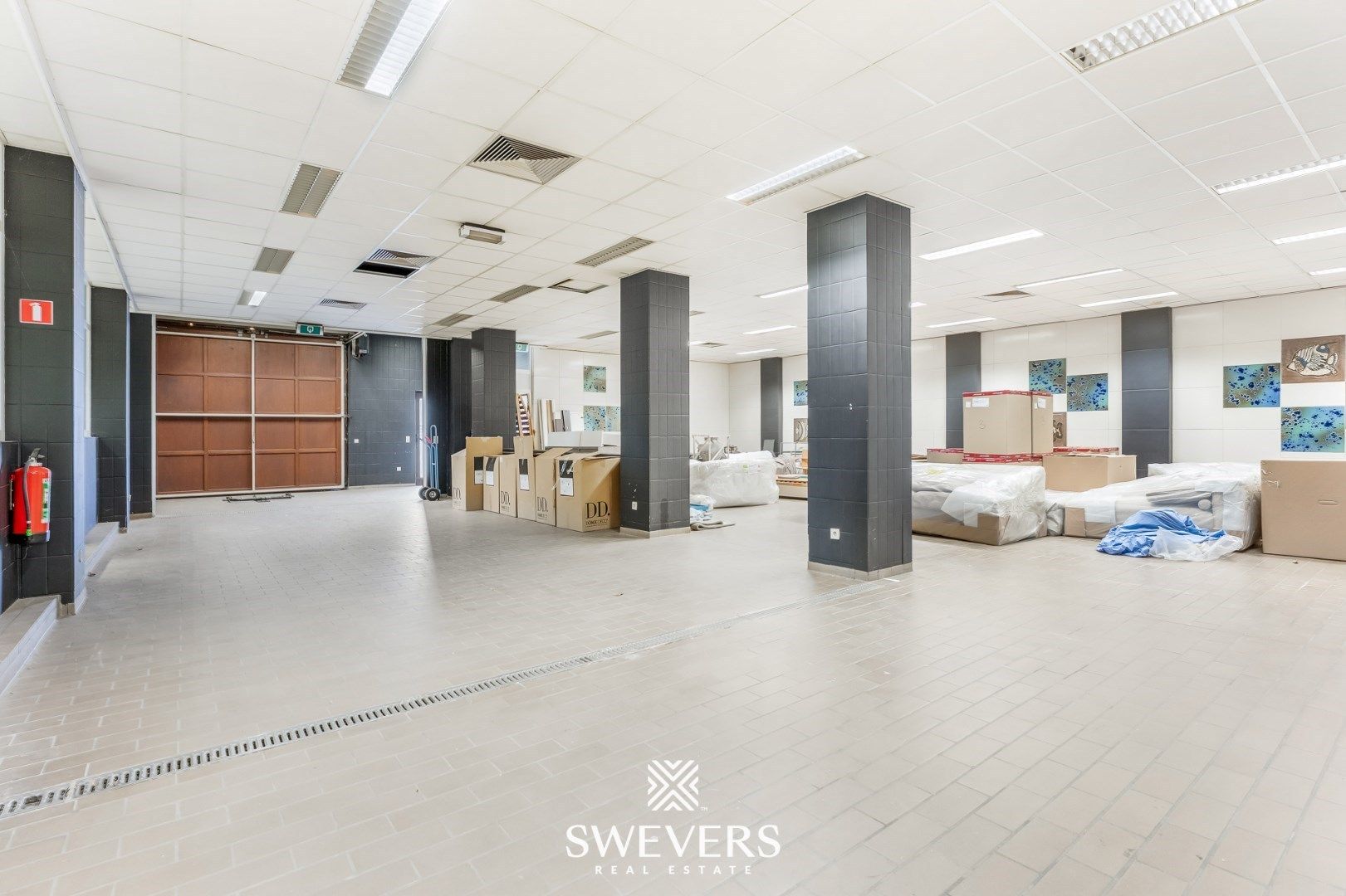 Handelspand met ruime woning in hartje Lummen – een unieke opportuniteit foto 29