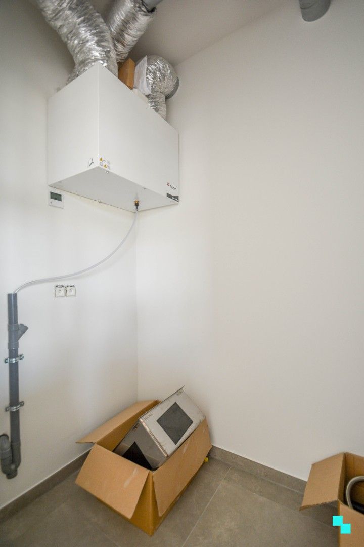 Bijna energieneutraal hoekapppartement aan kanaal Roeselare-Leie foto 12