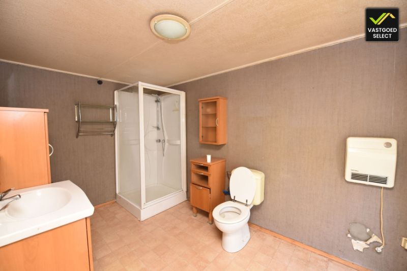 Vastgoed Select: Woning met mogelijkheden in het centrum van Sint-Laureins – 3 slaapkamers, garage en gelegen aan het Leopoldkanaal. foto 7