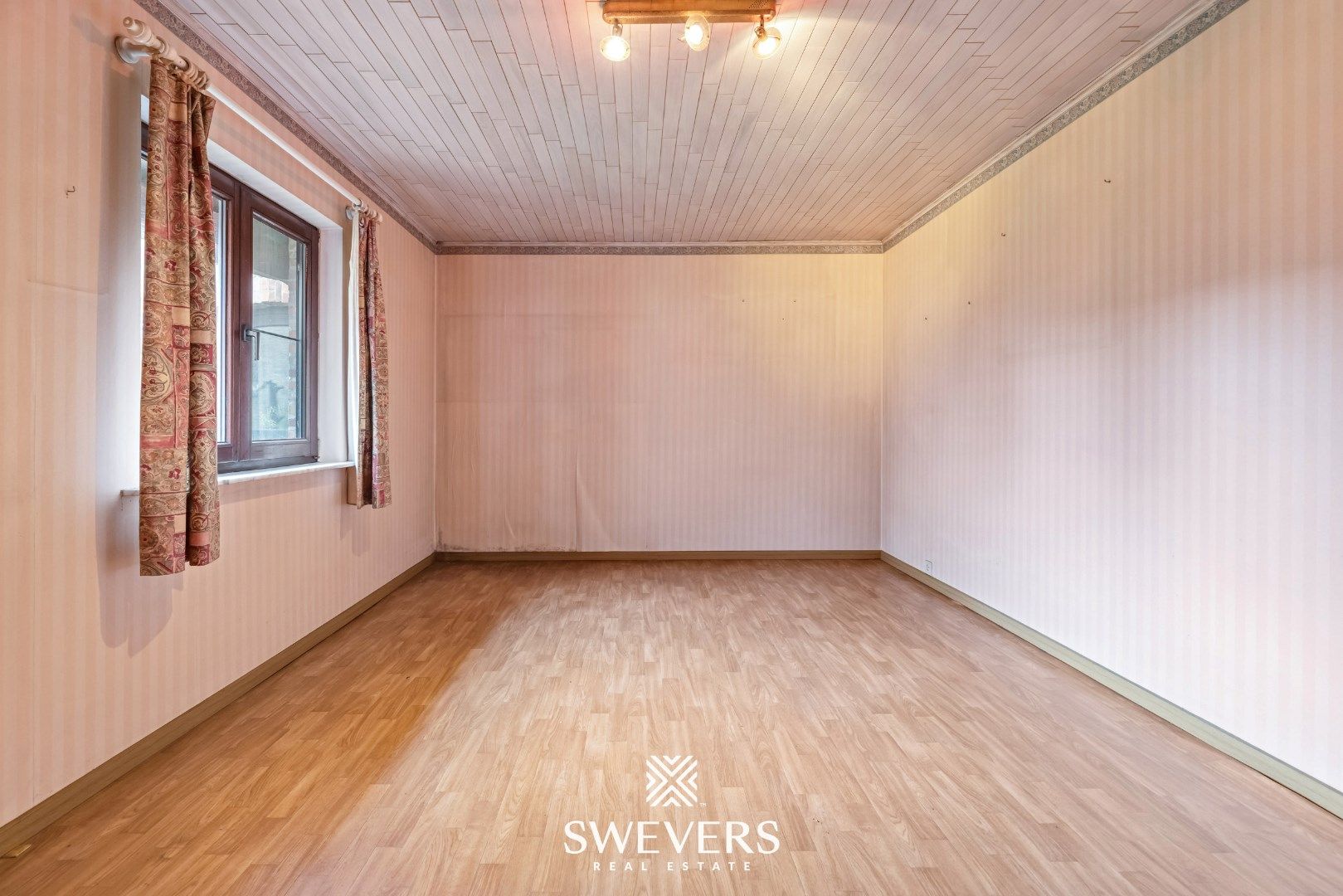 Karaktervolle woonst met renovatiepotentieel te Beverlo foto 12