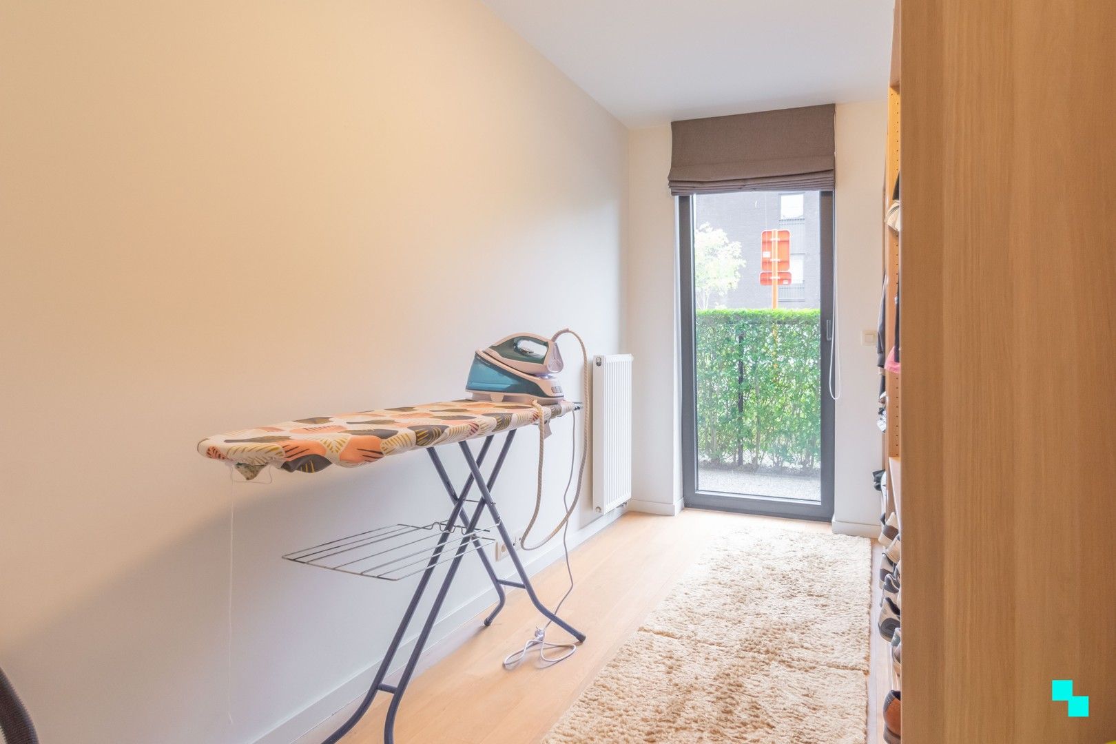 Ruim gelijkvloers appartement met tuin foto 13