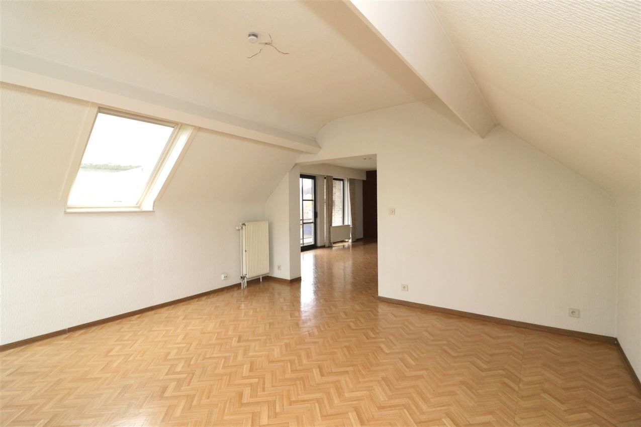 Centraal gelegen appartement met 3 slpk., garage en terras foto 33