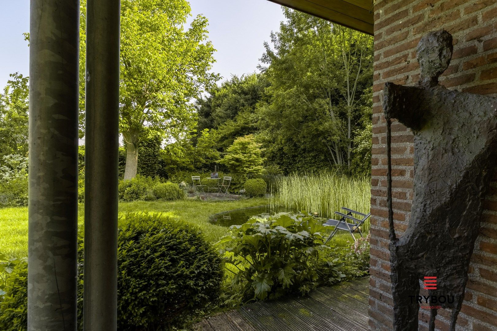 Unieke villa met atelier, aangelegde tuin en artistieke ziel foto 21