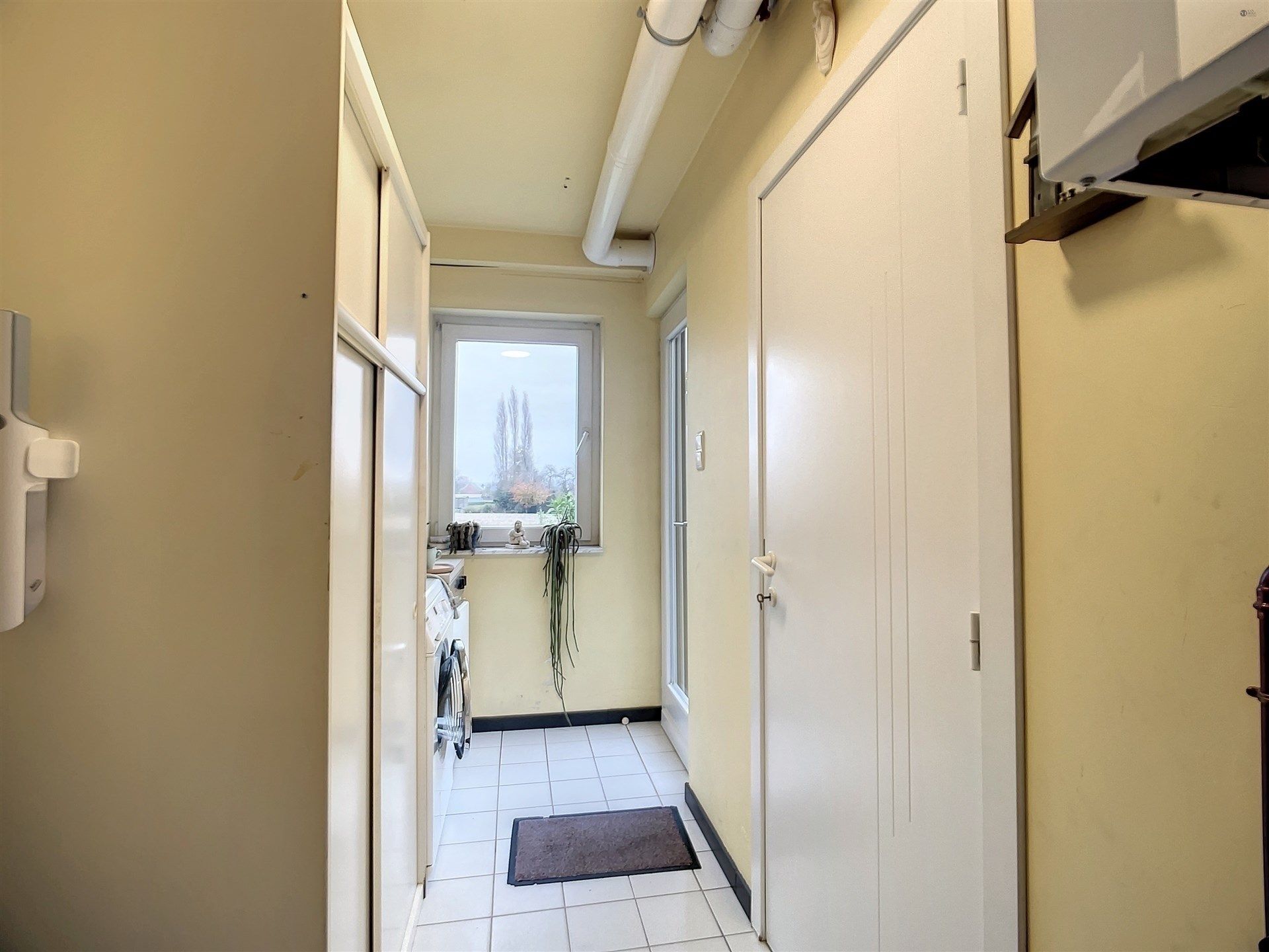 open bebouwing met 3 slaapkamers en garage op perceel van 886 m². foto 13