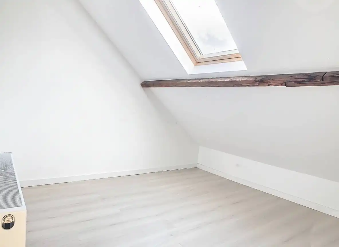 Instapklare rijwoning te koop met gezellige stadstuin  foto 10