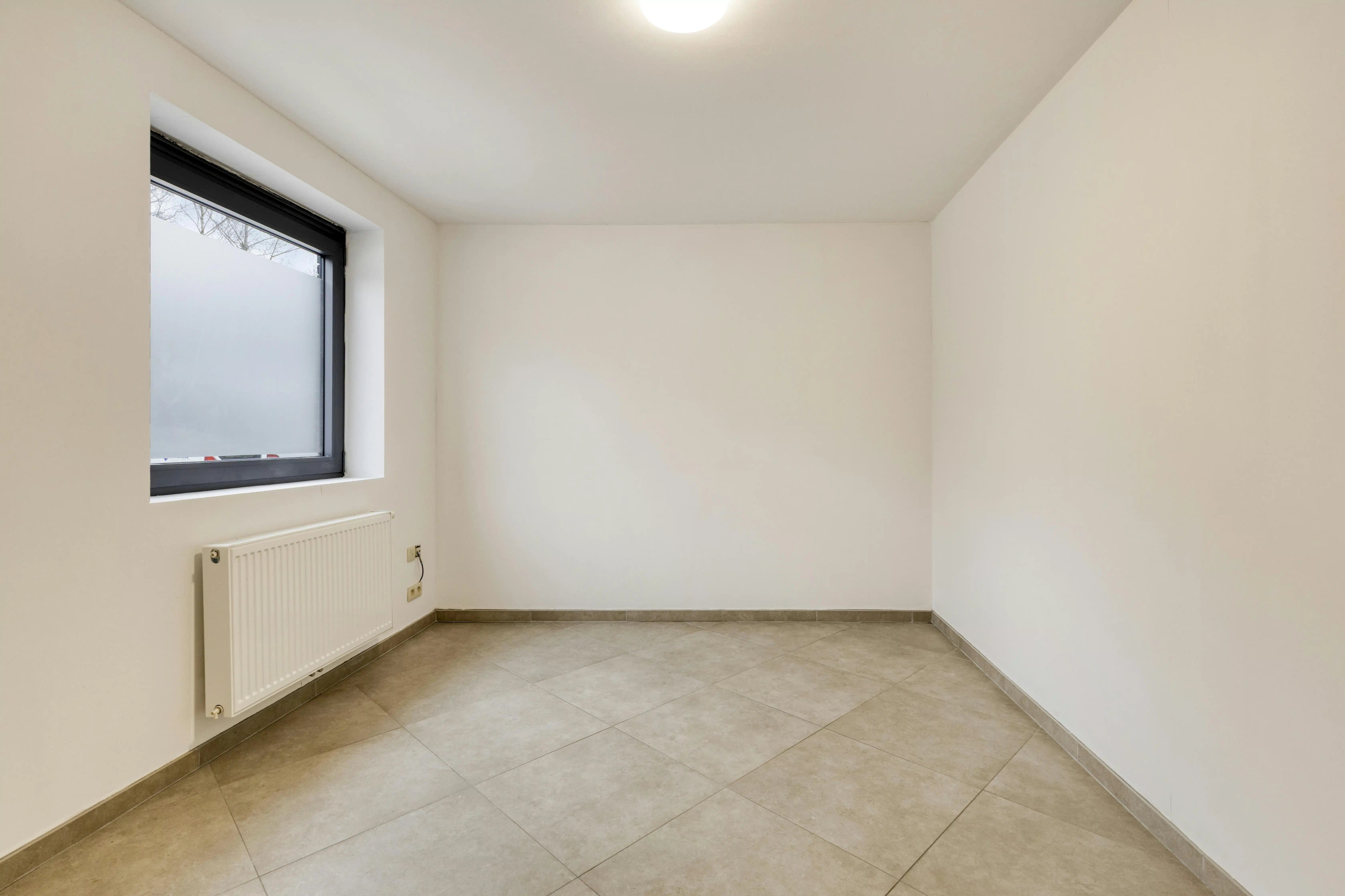 Bel-etagewoning met 2 buitenruimtes te koop in Zwijnaarde foto 12