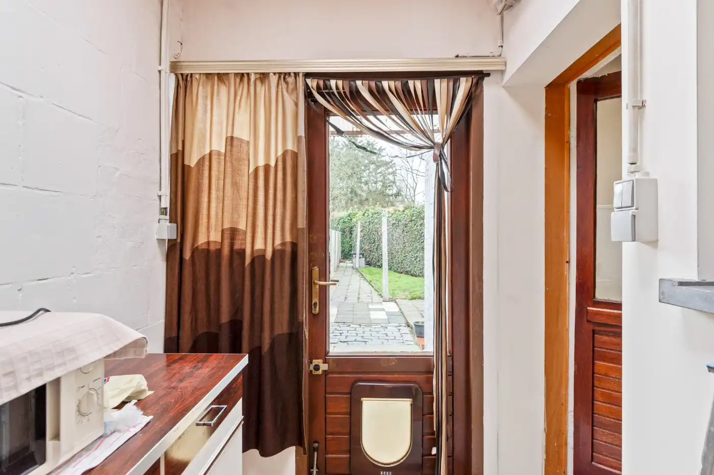 Leuke starterswoning met 2 slpk., garage en gezellig west-tuintje foto 11