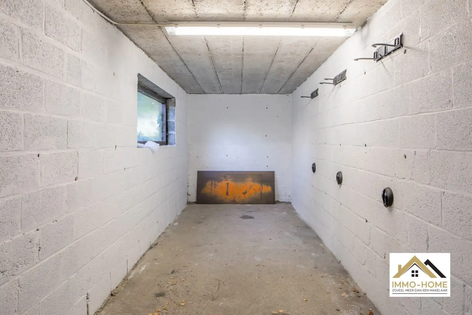 Zeer ruim gelijkvloers appartement met woonkelder en private tuin  foto 28