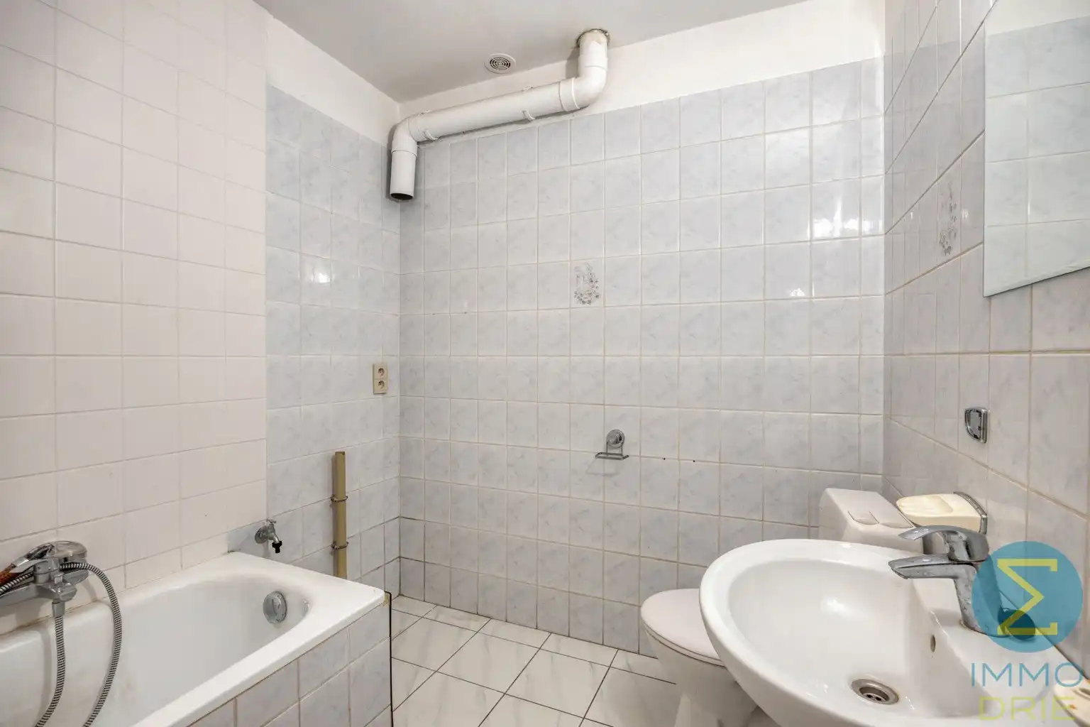 Opbrengsteigendom met 3 verhuurde appartementen en garages foto 12