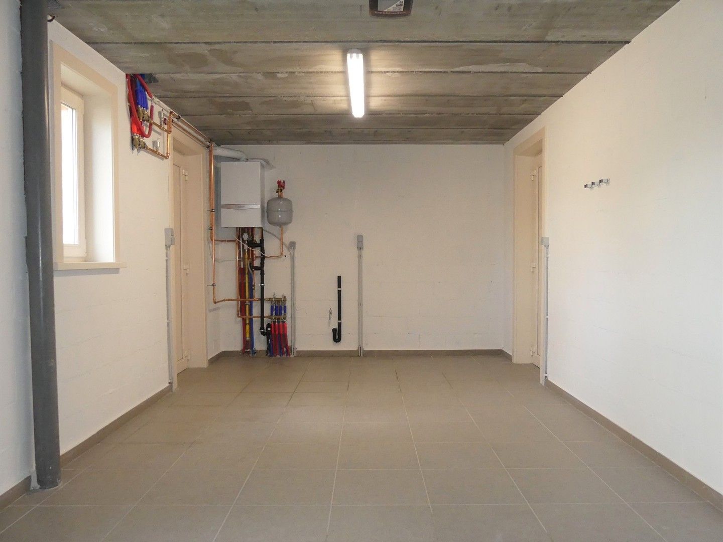 Halfopen nieuwbouwwoning met binnenterras, tuintje en garage - 3 slaapkamers foto 13