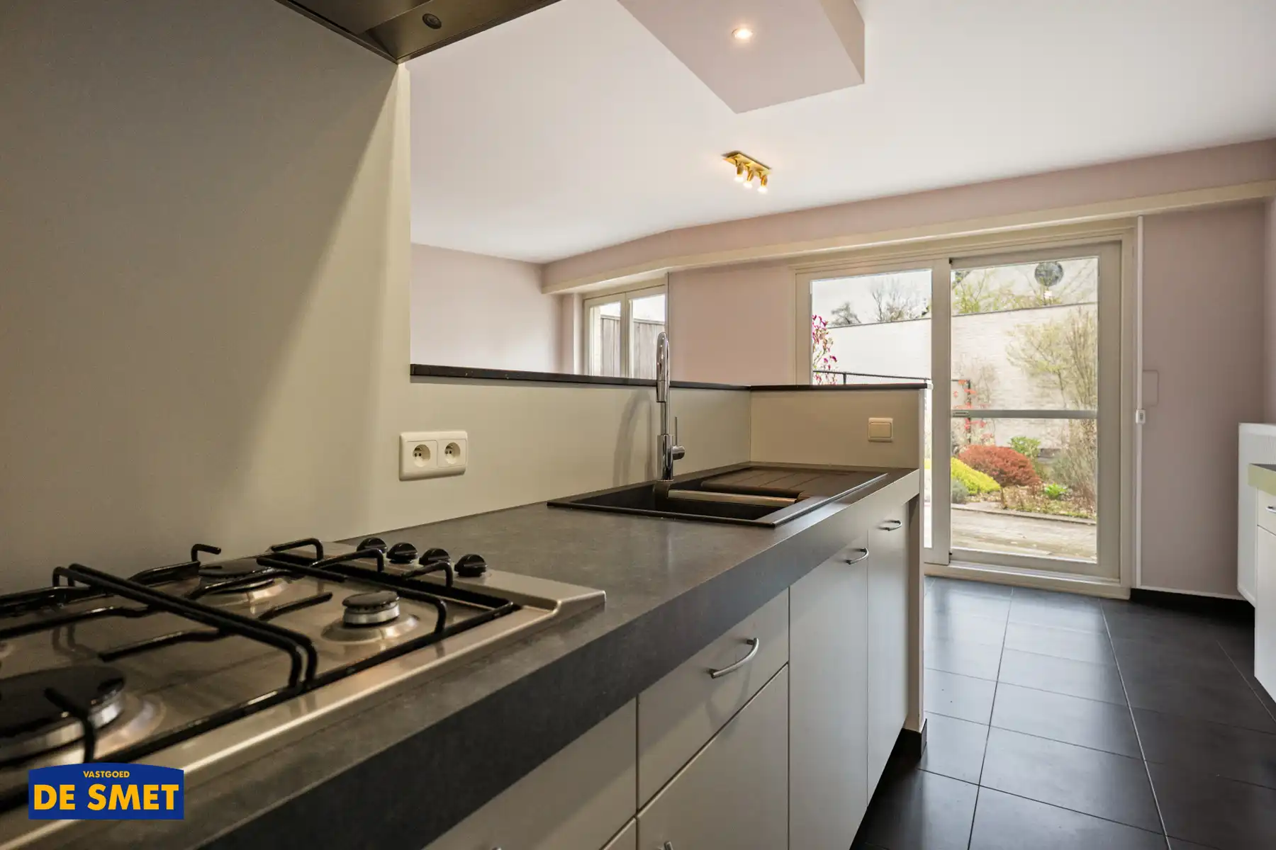 Gelijkvloers appartement met tuin, autostaanplaats én kelder foto 9