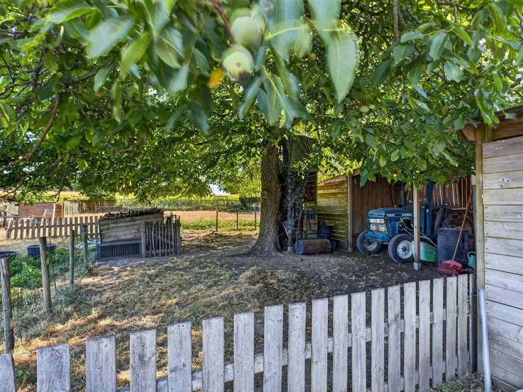 Charmante, rustig gelegen vrijstaande woning foto 11