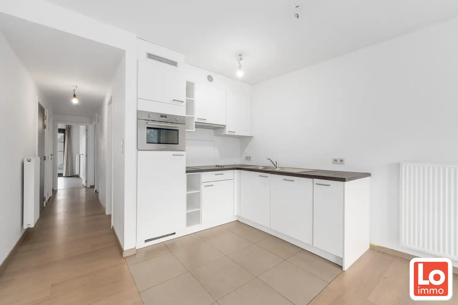 Mooi appartement met 2 slaapkamers en zuid-gericht terras in centrum Lochristi foto 4