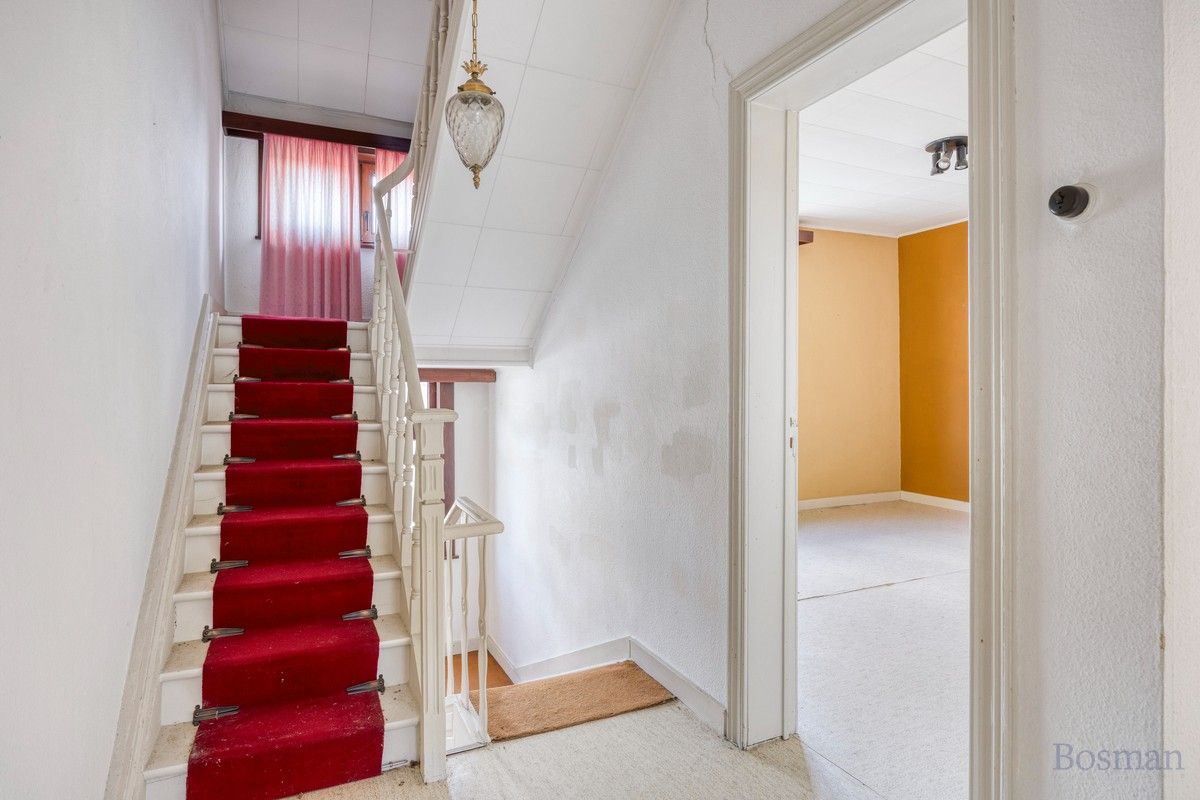 Te renoveren woning met 5 garageboxen te koop in Ham foto 12