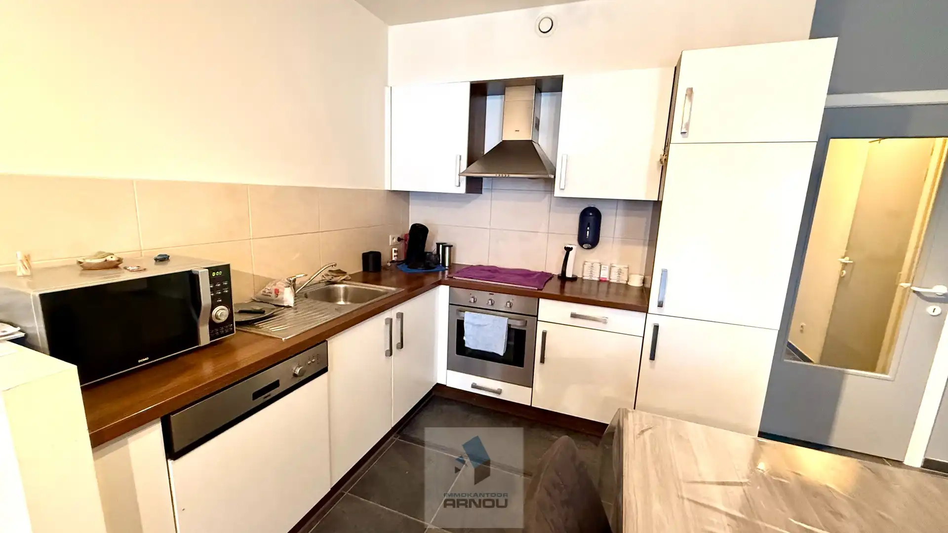 Gezellig gelijkvloers appartement met 1 slaapkamer, stadstuintje en privatieve autostaanplaats foto 8
