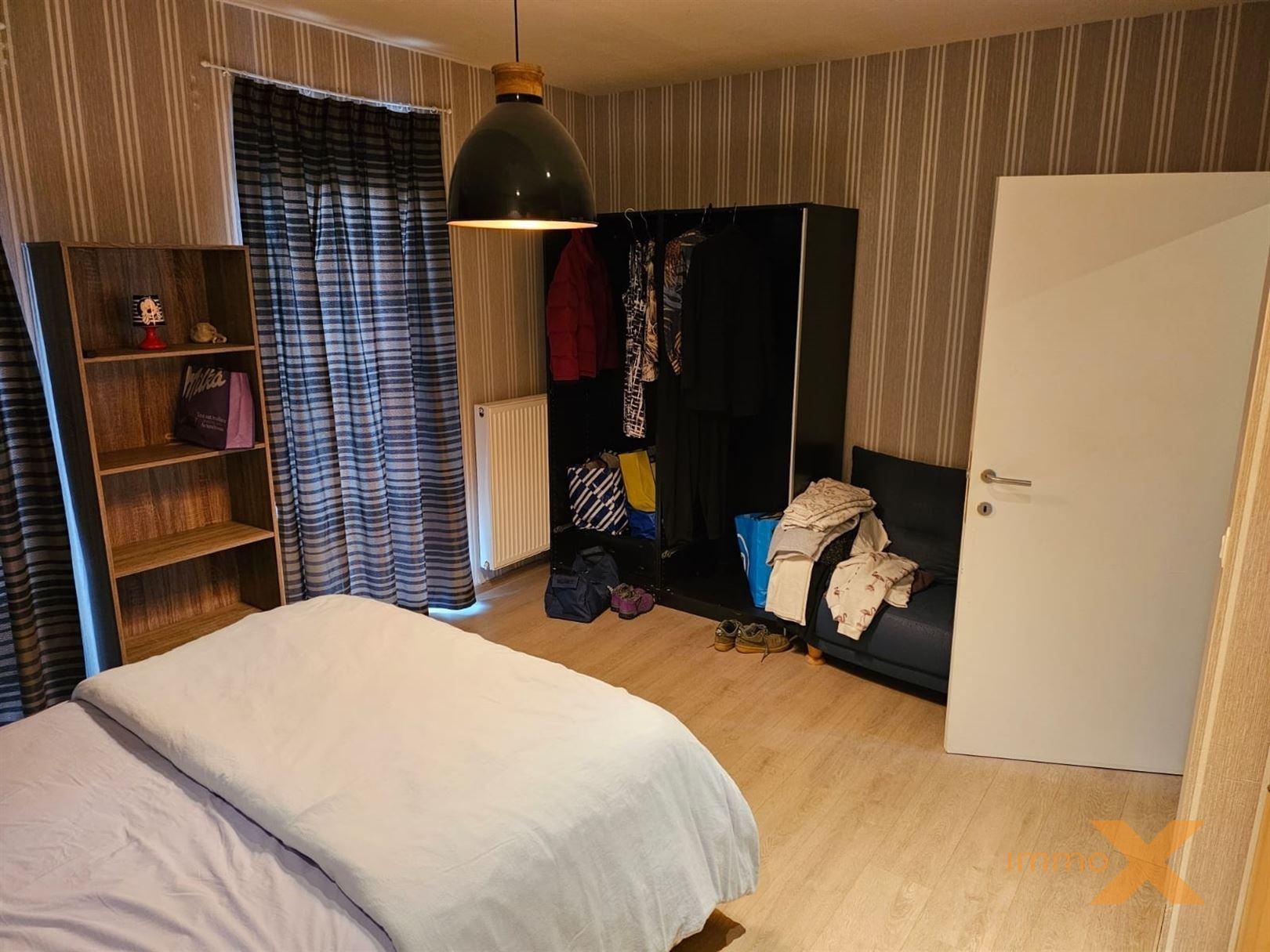 RUIM LICHTRIJK GELIJKVLOERS MET TUINTJE foto 21