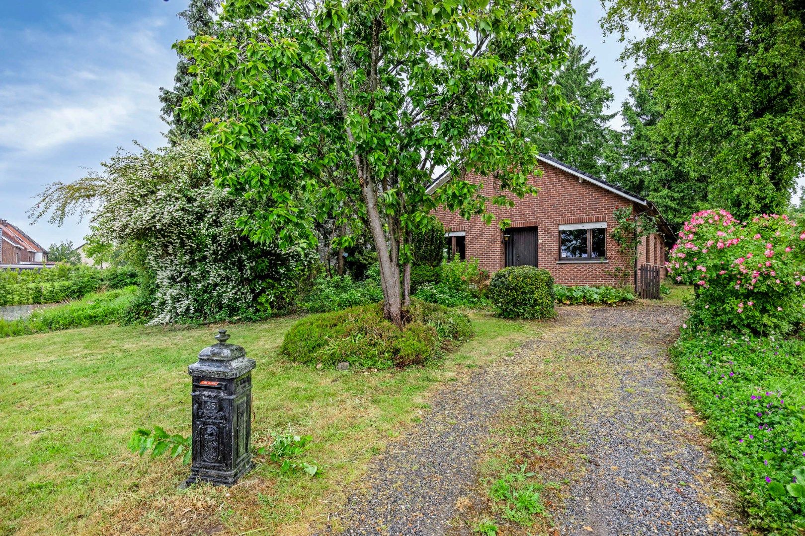 Hoofdfoto van de publicatie: Ruime gezinswoning met grote tuin op perceel van 14a 41ca in Blanden te koop - bewoonbare opp. 236 m²