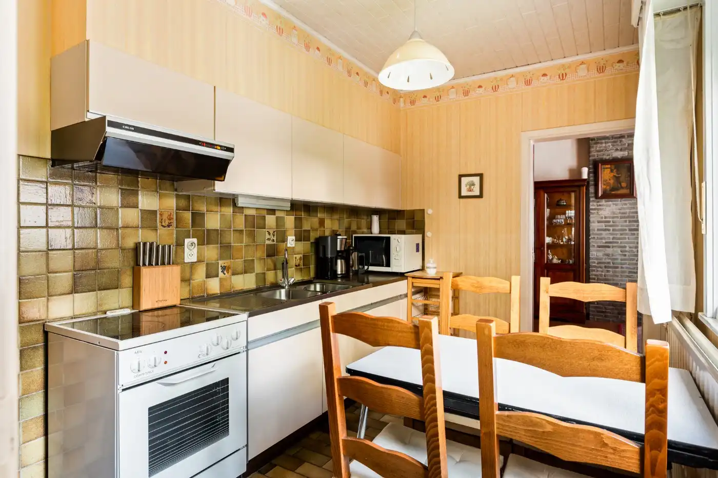 Te renoveren woning met 3 slpk., garage en tuintje foto 10