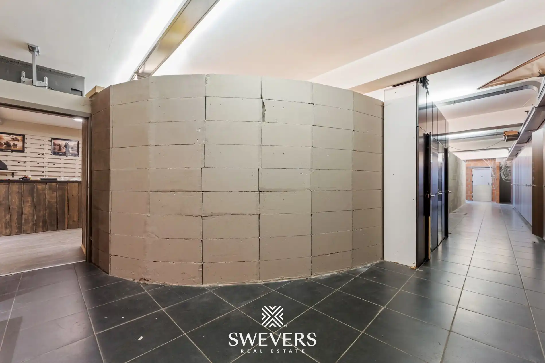 Uitzonderlijke mooi gelegen en ruime (391m²) handelsruimte in het volle centrum van Leopoldsburg foto 12