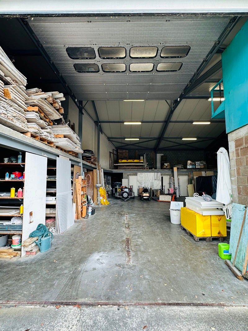 Ruim magazijn met kantoren met veel potentieel te Kuringen foto 14