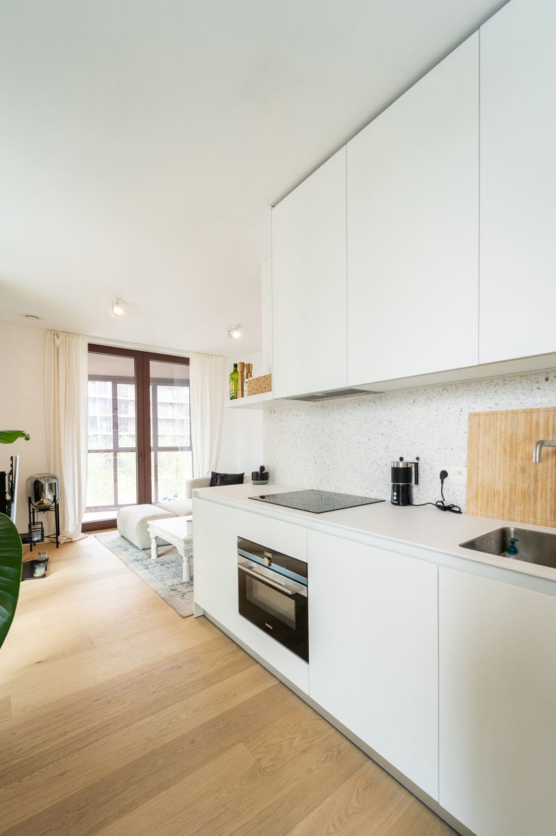 Gloednieuw appartement op het hippe “Nieuw zuid” foto 10