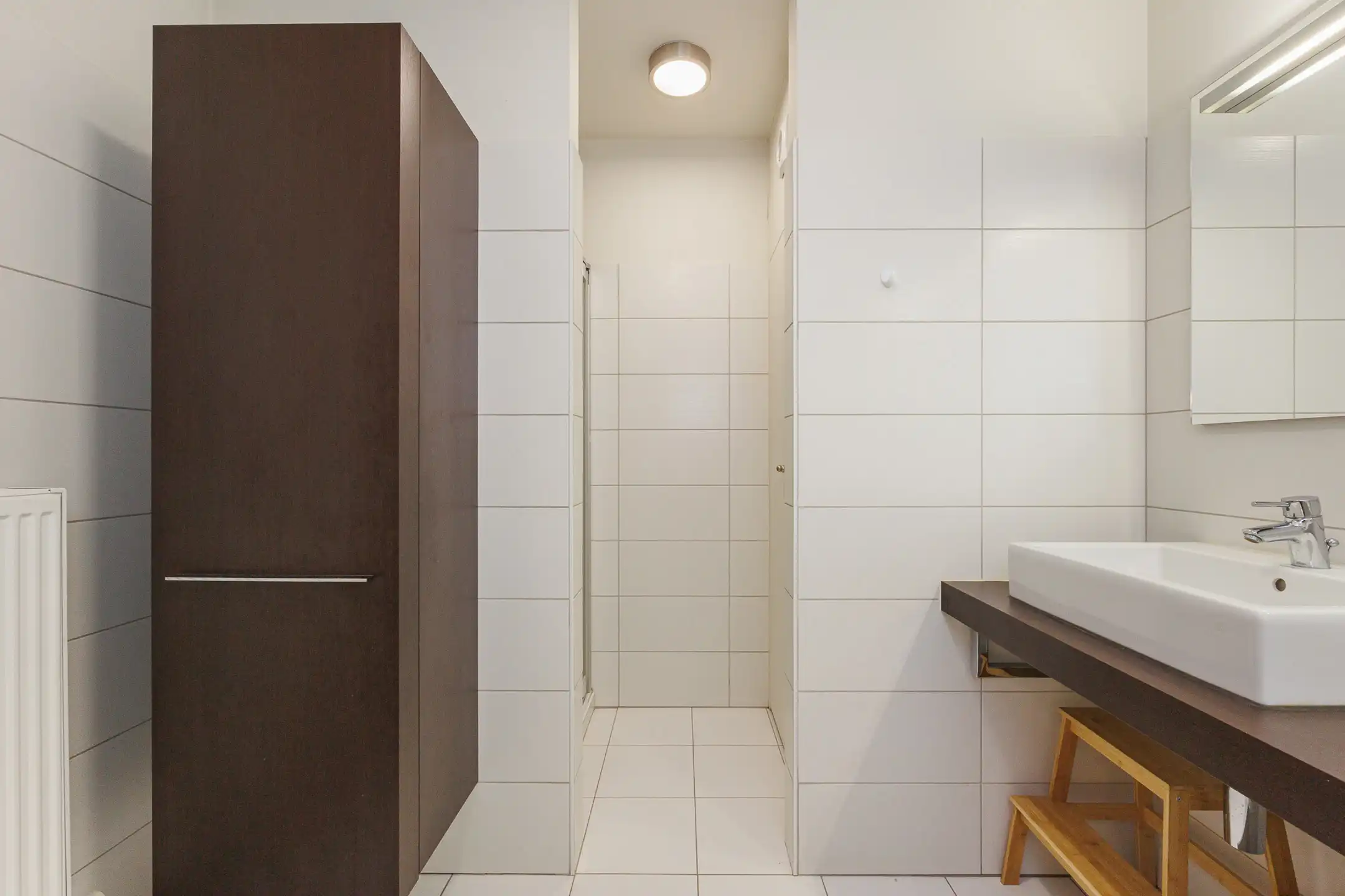 Gelijkvloers appartement met terras/tuintje te huur foto 13