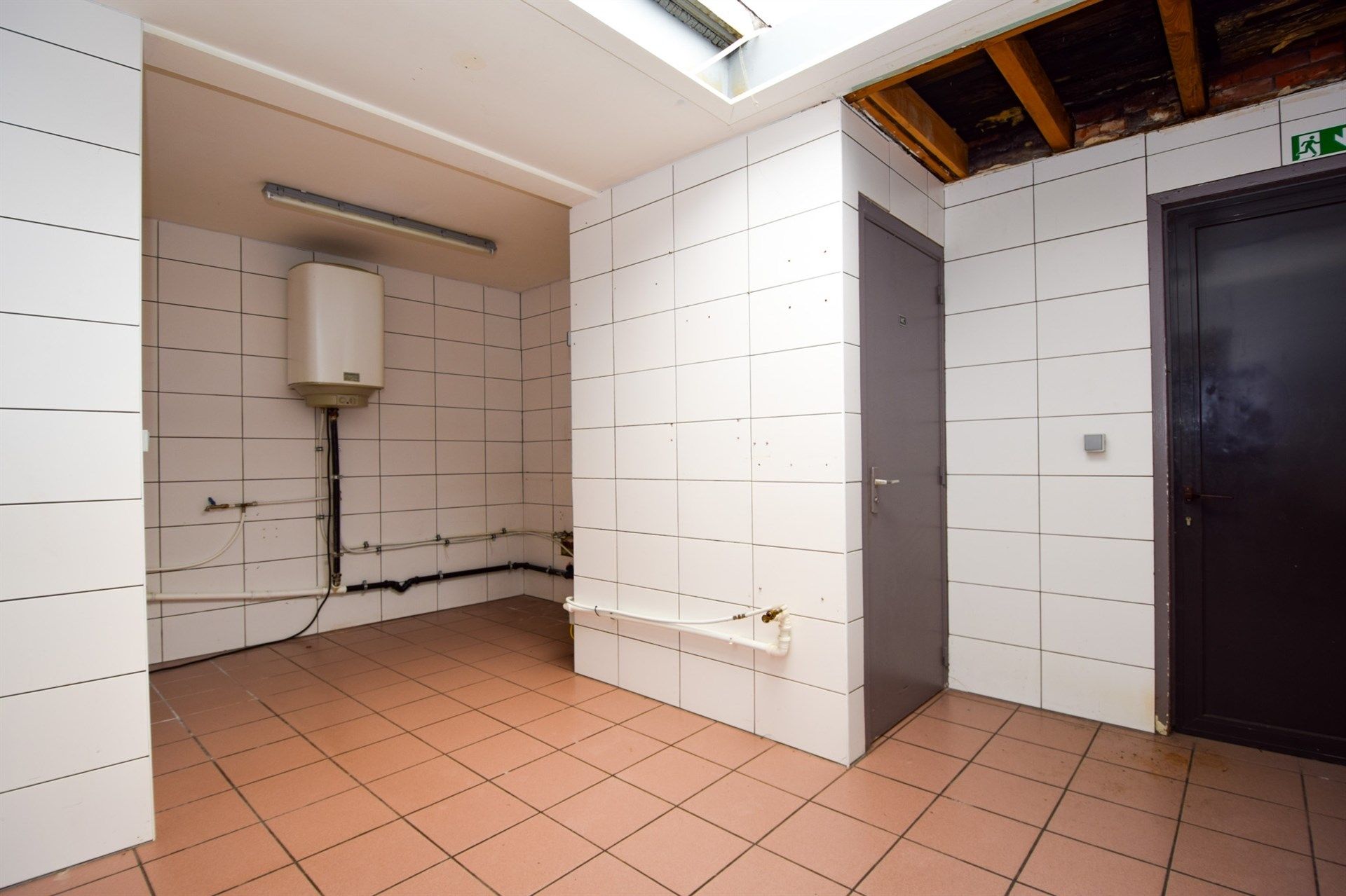 Uitstekend gelegen opbrengsteigendom bestaande uit handelsgelijkvloers + duplex appartement foto 9