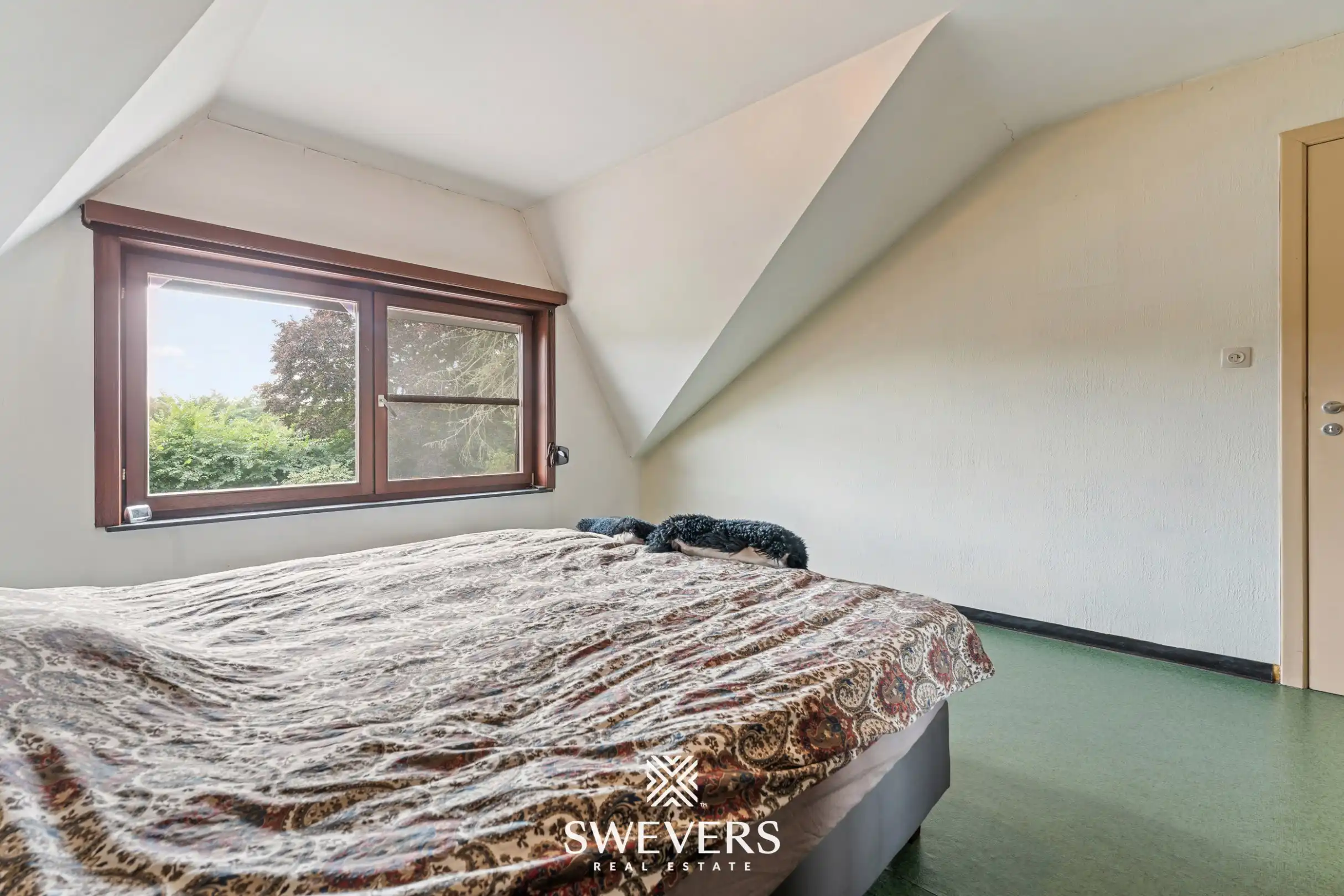 Uitstekend gelegen woning met 4 slaapkamers en mooie tuin foto 26