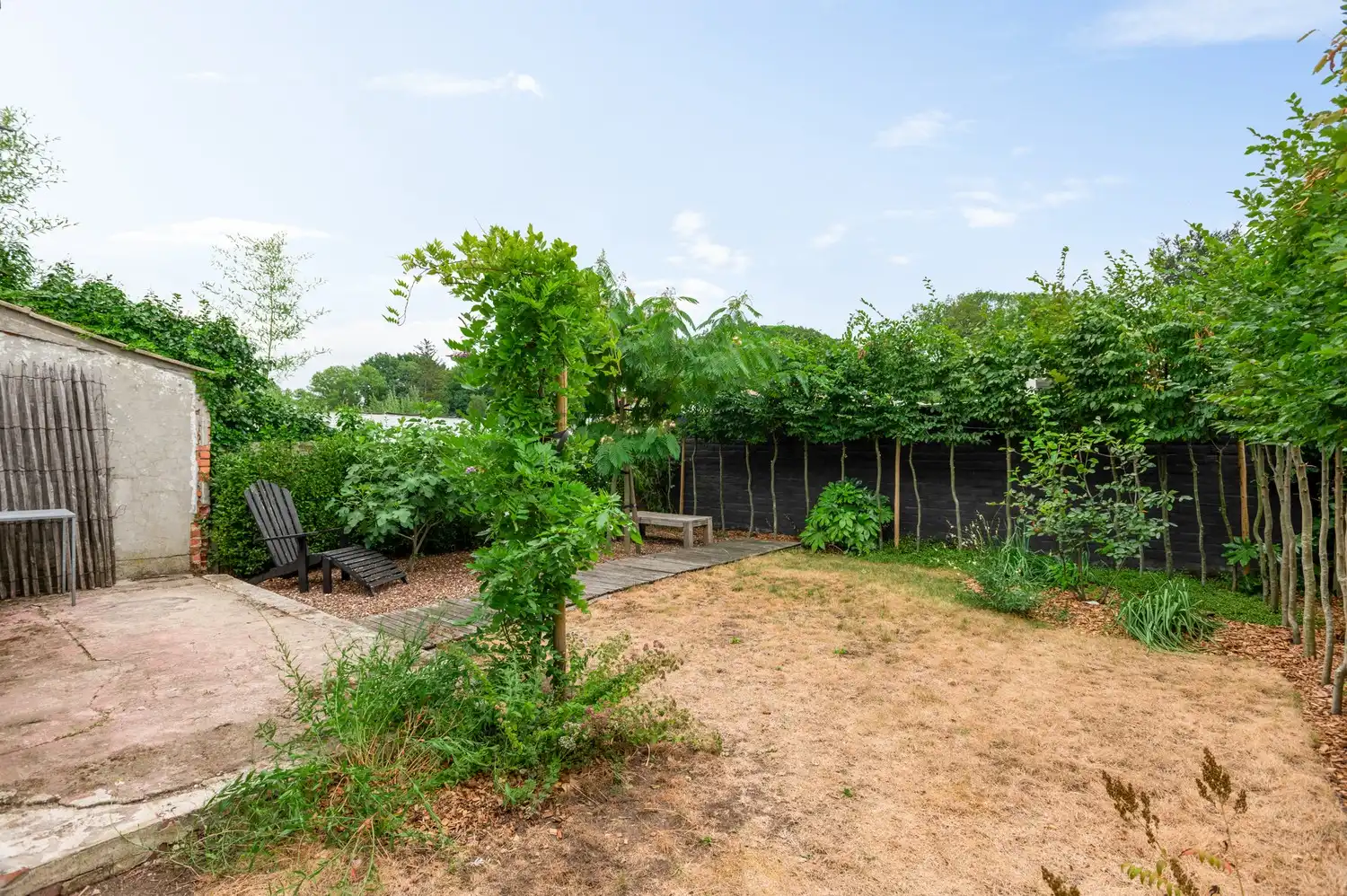 Prachtig gerenoveerd gelijkvloers appartement met zonnige tuin, grote oprit  en ruime garagebox foto 18