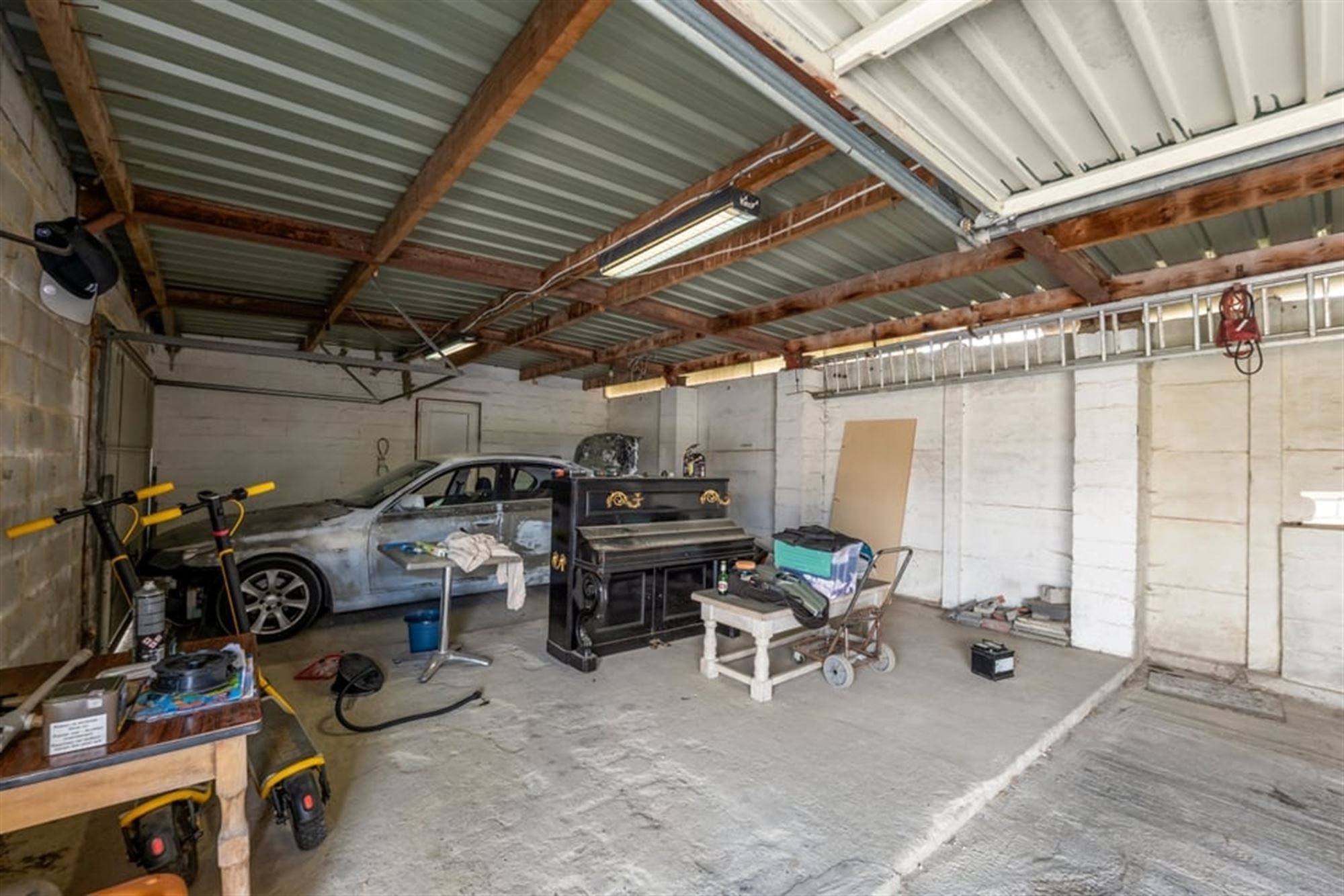 RUIME GEZINSWONIG MET VEEL POTENTIEEL EN EEN RUIME GARAGE IN SINT-TRUIDEN  foto 35
