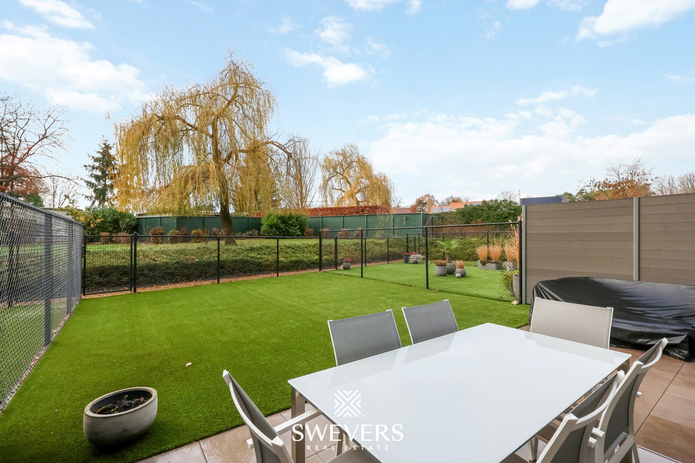 Gelijkvloers appartement met privétuin en dubbele garage foto 21