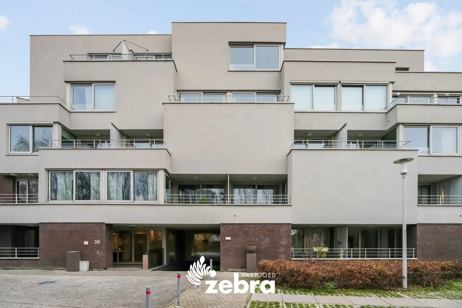 Moderne serviceflat met prachtig zicht op de Leie en autostaanplaats te Deinze! foto 27