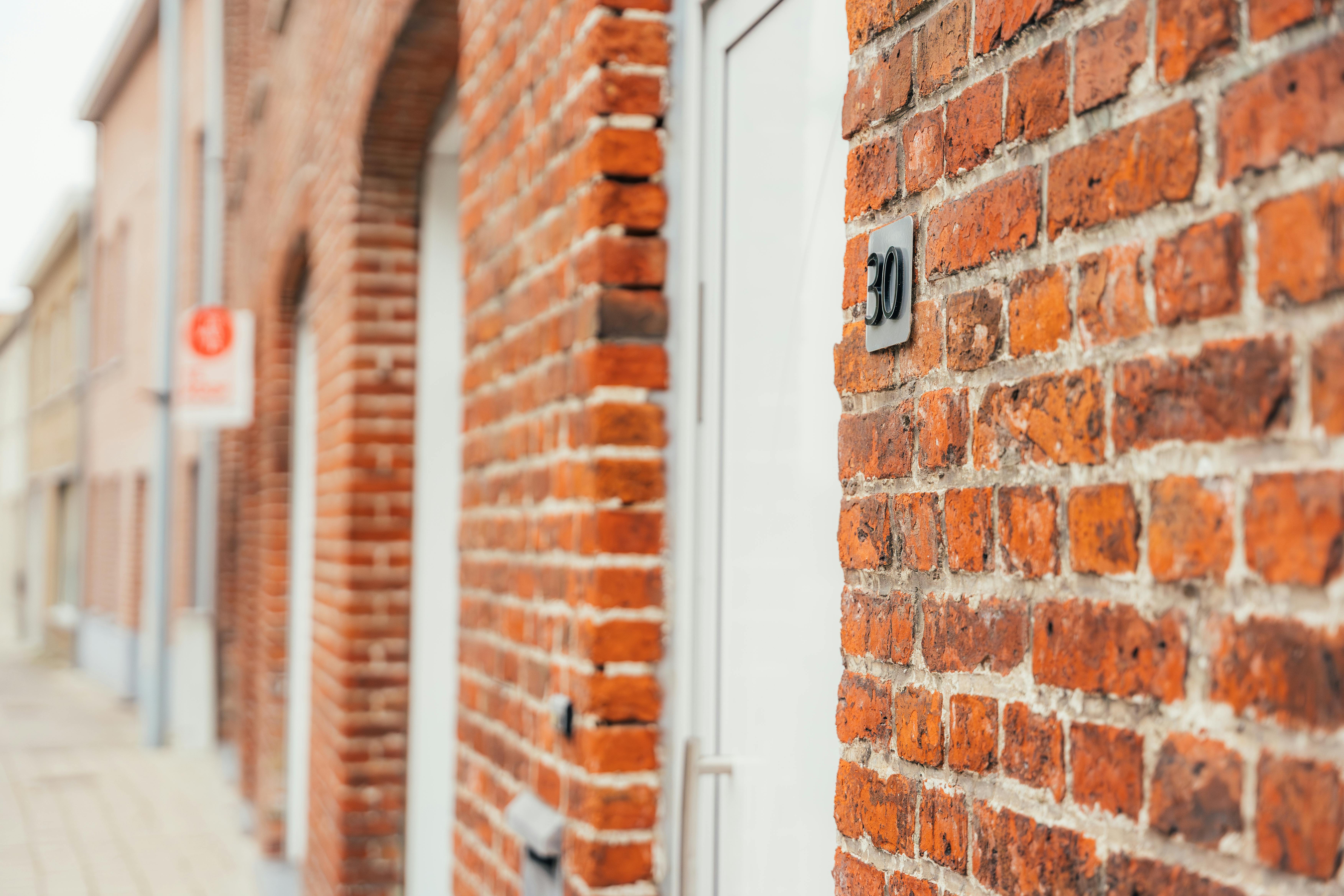 Polyvalent eigendom: woning, winkelruimte én loods te koop in Merkem op 1.885m² foto 2