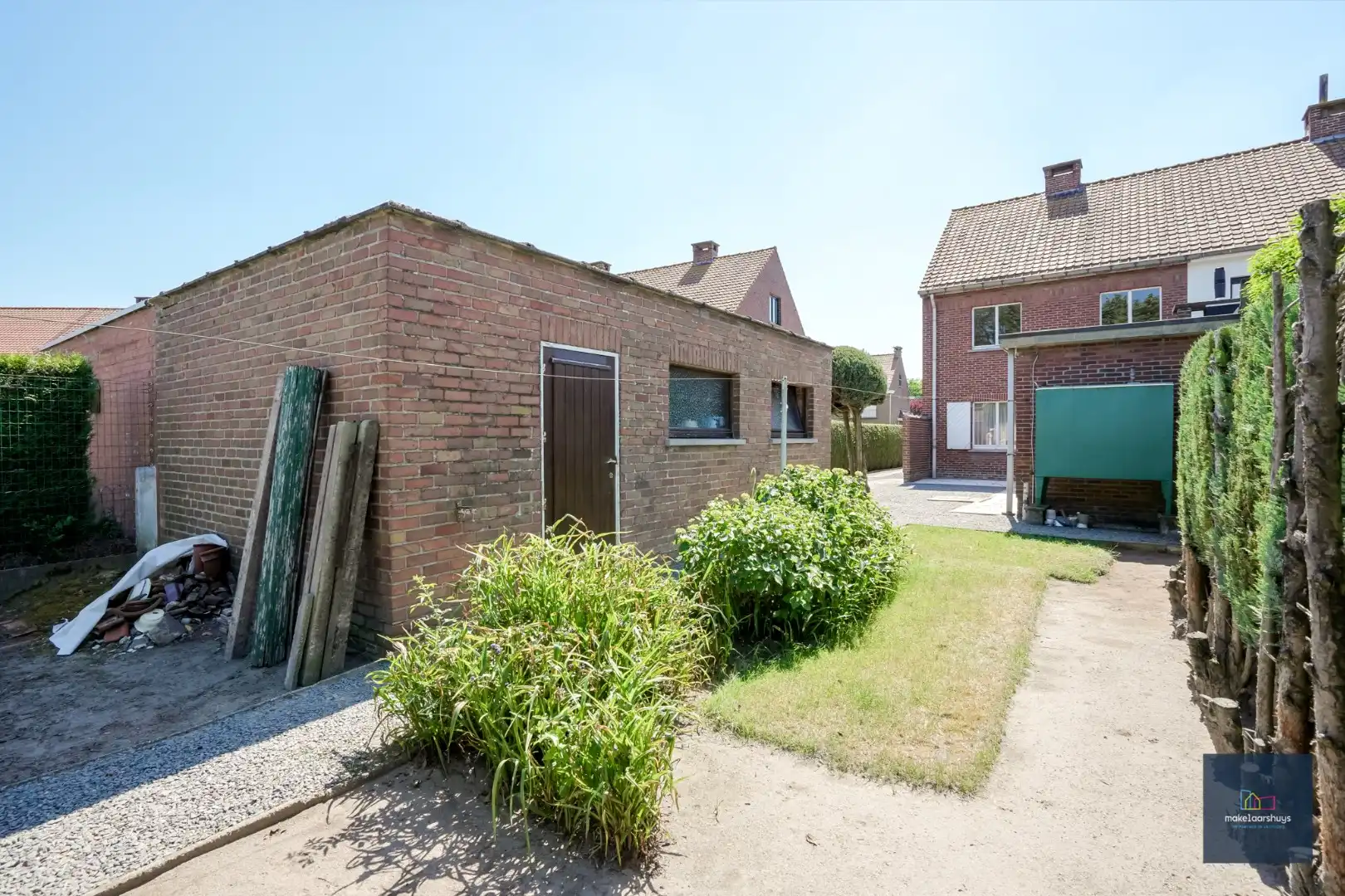 Te renoveren HOB met garage en bijgebouw op een mooi perceel foto 13